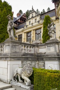 Lions and statues in the courtyard of the Peles Castle, Sinaia